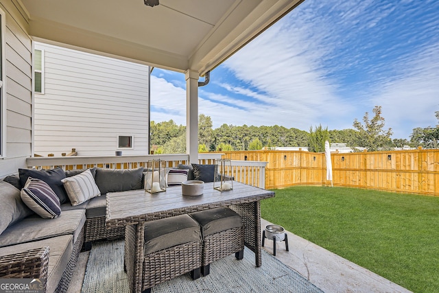 view of patio with a fenced backyard and an outdoor living space