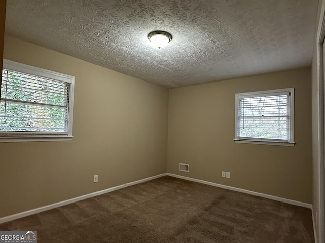 2929 Stratford Mill Rd, Lithonia, GA 30038 - spare room with carpet, a textured ceiling, and baseboards