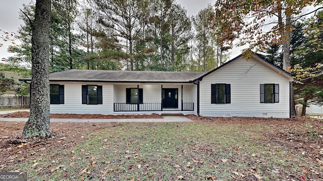 245 Southmoor Cir, Stockbridge, GA 30281 - ranch-style home with covered porch, crawl space, and fence