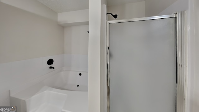 245 Southmoor Cir, Stockbridge, GA 30281 - bathroom with a stall shower and a bath