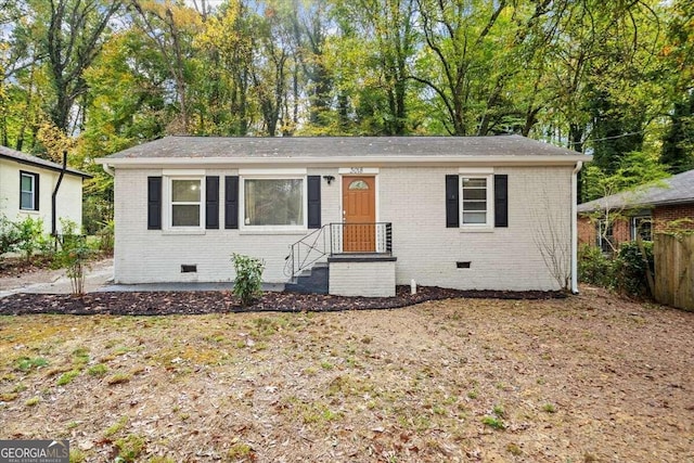 3018 Wanda Cir SW, Atlanta, GA 30315 - ranch-style home with crawl space, brick siding, and view of wooded area