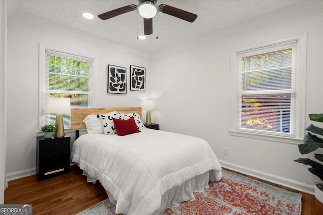 3018 Wanda Cir SW, Atlanta, GA 30315 - bedroom with wood finished floors, baseboards, crown molding, and a ceiling fan