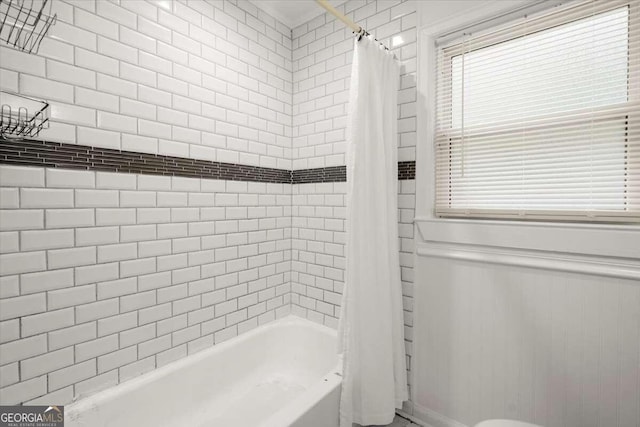 3018 Wanda Cir SW, Atlanta, GA 30315 - bathroom featuring shower / bath combination with curtain and healthy amount of natural light