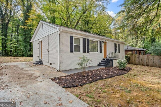 3018 Wanda Cir SW, Atlanta, GA 30315 - single story home with brick siding, fence, crawl space, and a patio