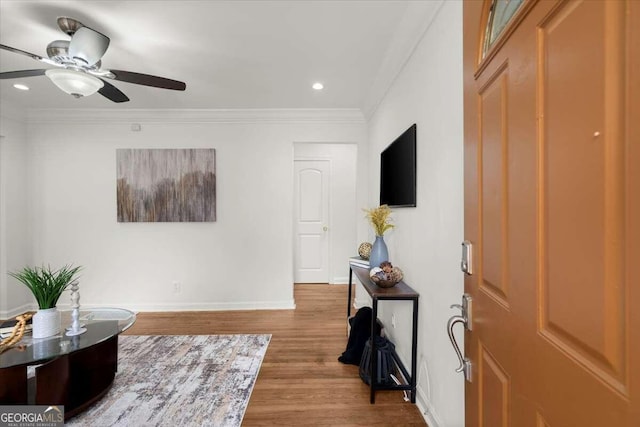 3018 Wanda Cir SW, Atlanta, GA 30315 - living room featuring baseboards, wood finished floors, crown molding, a ceiling fan, and recessed lighting