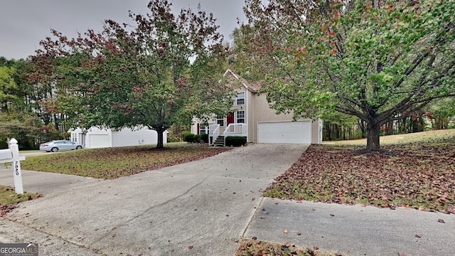 obstructed view of property featuring a garage