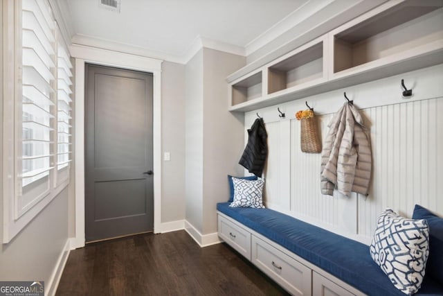 mudroom featuring dark hardwood / wood-style flooring and crown molding