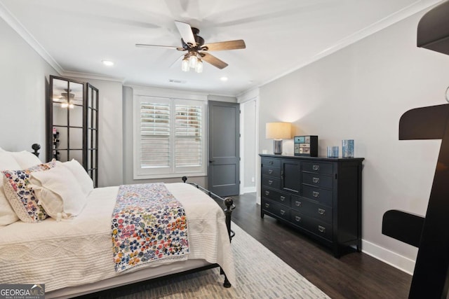 bedroom with dark wood-type flooring, ceiling fan, and crown molding