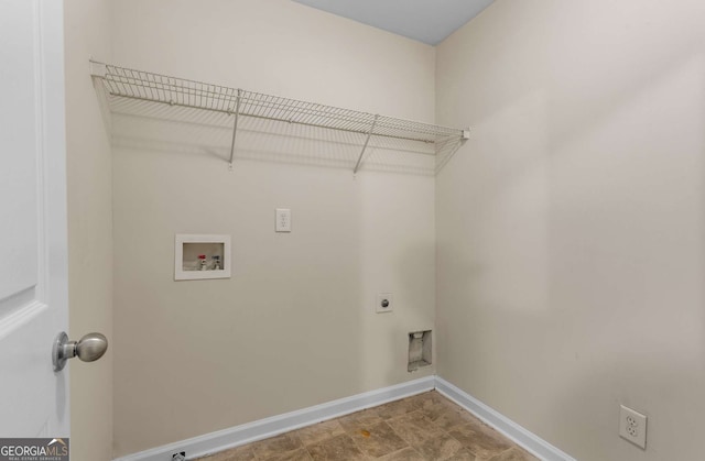 clothes washing area featuring hookup for a washing machine and hookup for an electric dryer