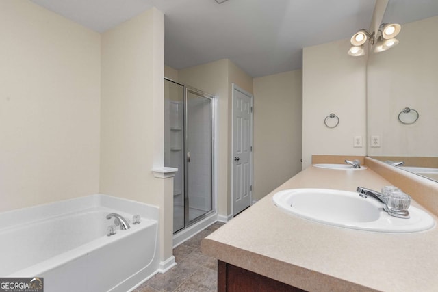 bathroom with independent shower and bath, vanity, and tile patterned flooring