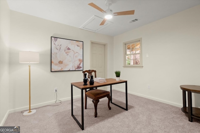 home office featuring light colored carpet and ceiling fan