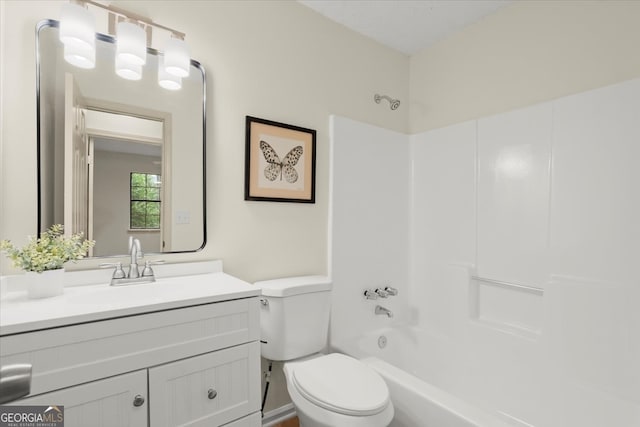 full bathroom featuring vanity, toilet, and shower / washtub combination