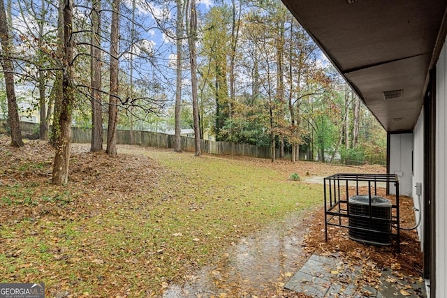 view of yard featuring central AC