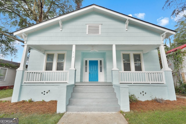 bungalow-style home with a porch