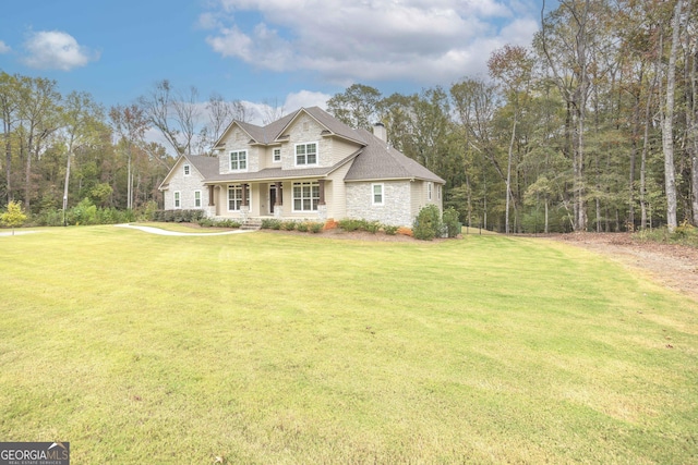 view of front facade with a front lawn