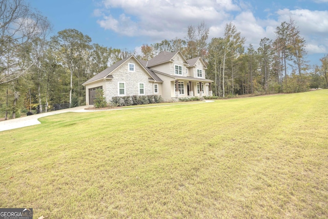 view of front facade with a front lawn and a garage