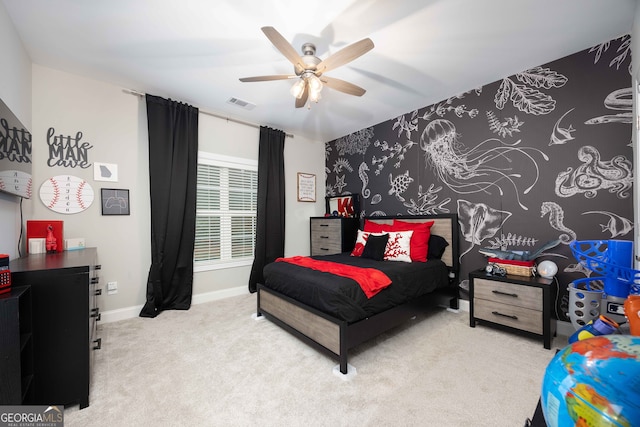 bedroom with ceiling fan and light colored carpet