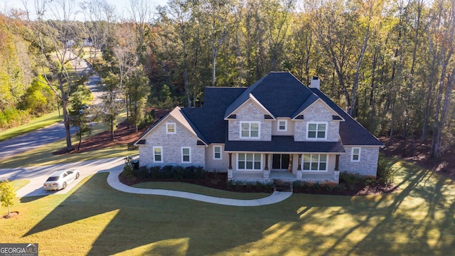 view of front of home featuring a front yard