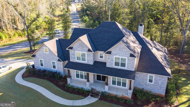 view of front of property with a front lawn and a patio area