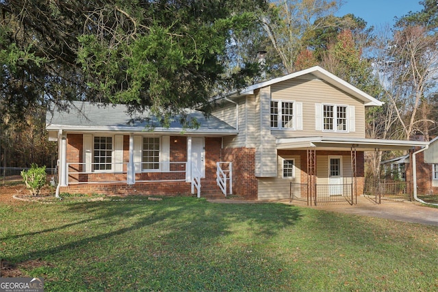 view of front facade featuring covered porch and a front lawn