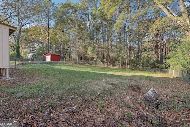 view of yard with a storage shed