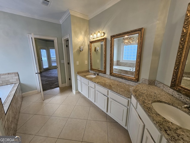 bathroom with tiled tub, tile patterned flooring, vanity, and ornamental molding