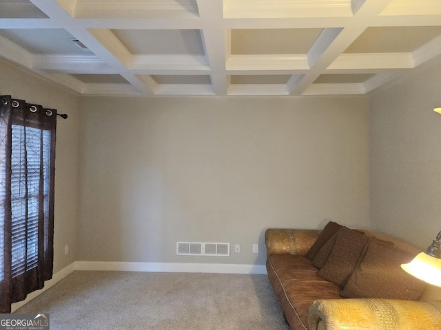 sitting room featuring beam ceiling, carpet floors, and coffered ceiling