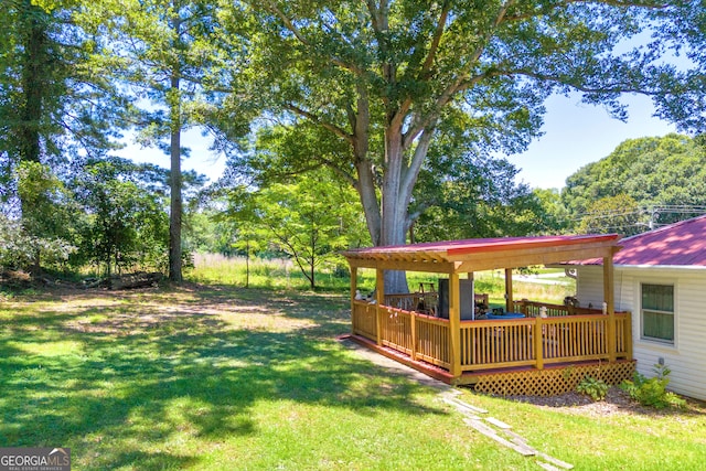 view of yard with a deck