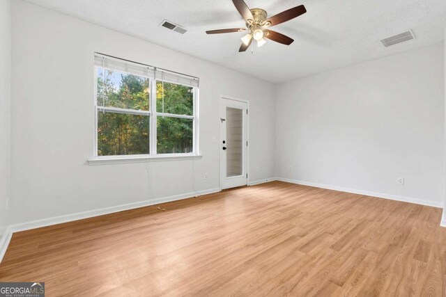 2357 Bayrose Cir Unit 57B, Atlanta, GA 30344 - spare room with ceiling fan, a textured ceiling, and light hardwood / wood-style floors