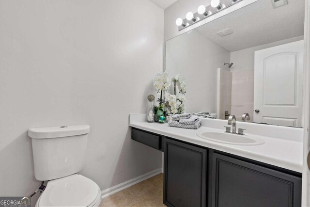 2357 Bayrose Cir Unit 57B, Atlanta, GA 30344 - bathroom with a shower, tile patterned flooring, vanity, and toilet