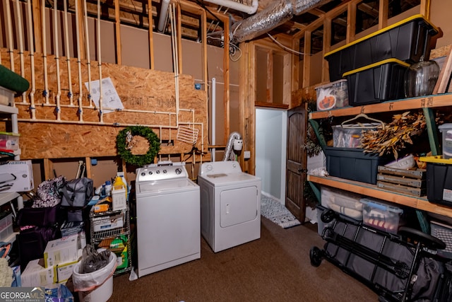 laundry area featuring independent washer and dryer and dark colored carpet