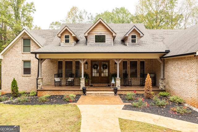 view of front of house with a front lawn and covered porch