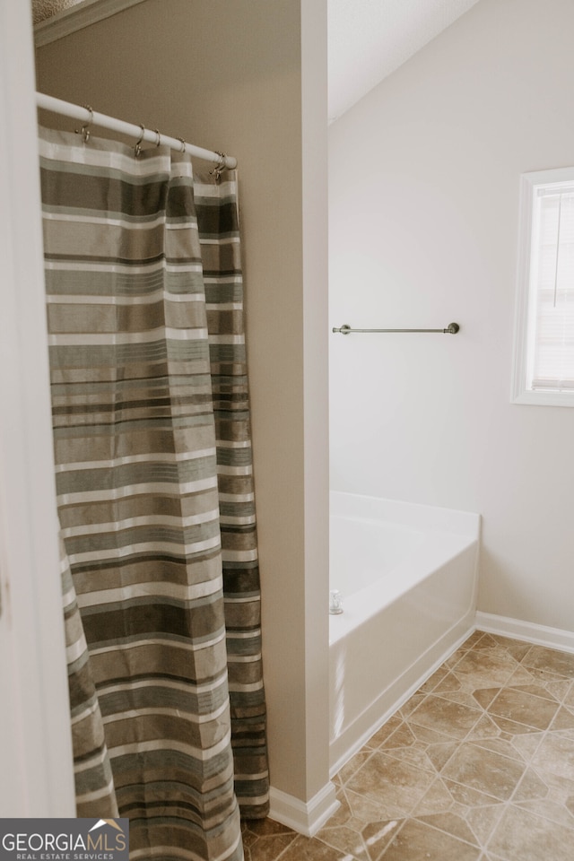 bathroom featuring a bathing tub