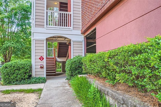 entrance to property with a balcony