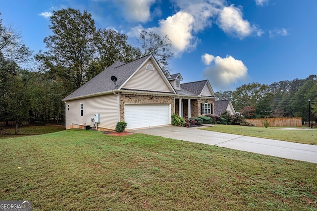 front of property with a garage and a front lawn