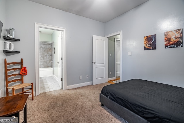 bedroom with carpet flooring and ensuite bath