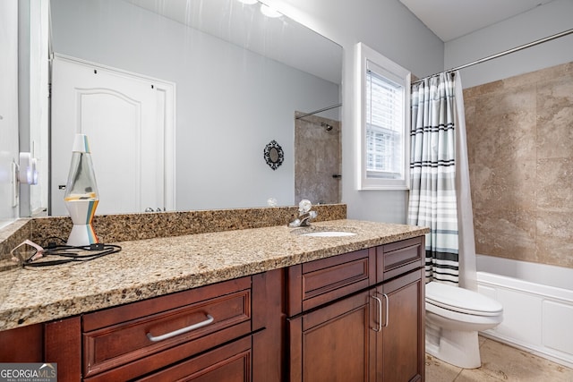 full bathroom with tile patterned flooring, shower / tub combo with curtain, vanity, and toilet