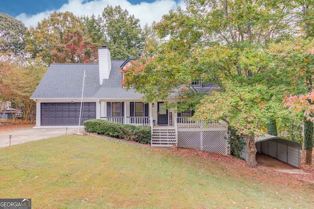 view of front of home with a garage, a porch, a front yard, and a carport