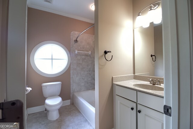 full bathroom with vanity, tile patterned floors, crown molding, tiled shower / bath, and toilet