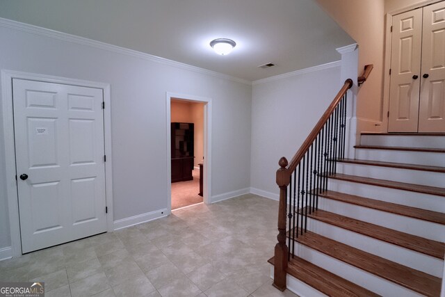 stairs with crown molding