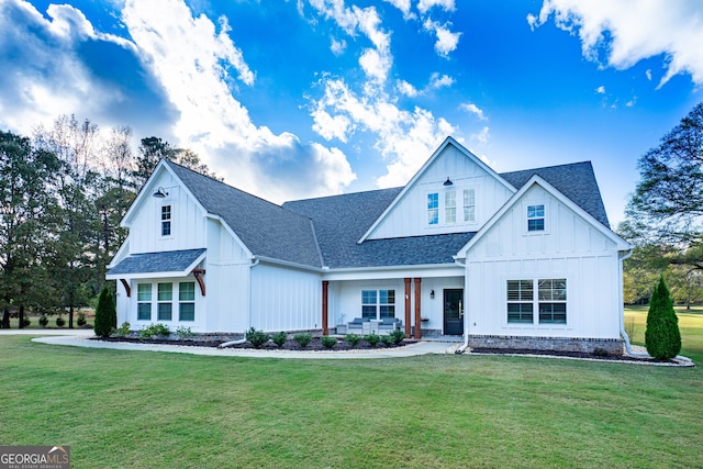 view of front of home with a front yard