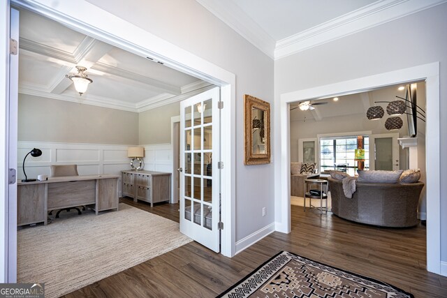 home office featuring beam ceiling, ceiling fan, coffered ceiling, dark hardwood / wood-style floors, and ornamental molding