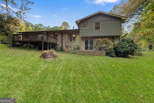 back of house with a deck and a lawn