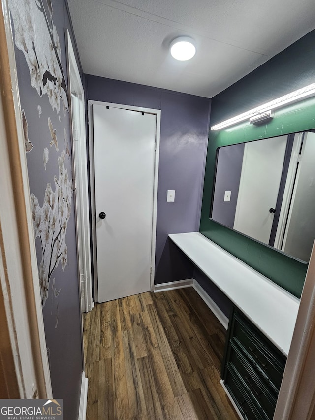 bathroom with wood-type flooring