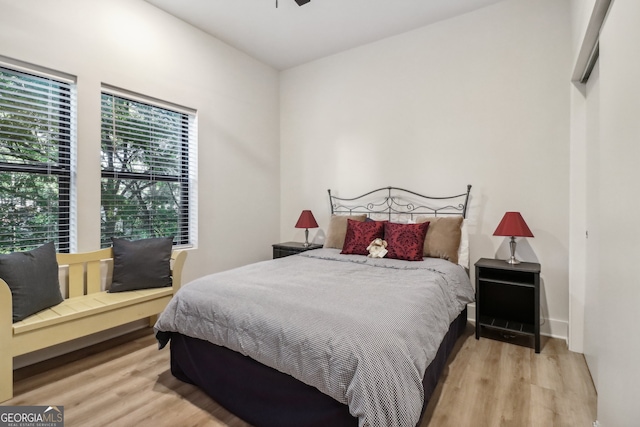 bedroom with light wood-type flooring