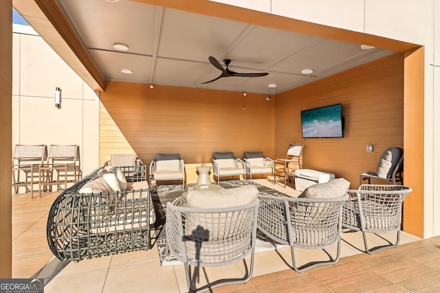 view of patio featuring an outdoor hangout area and ceiling fan