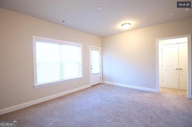 empty room with light carpet