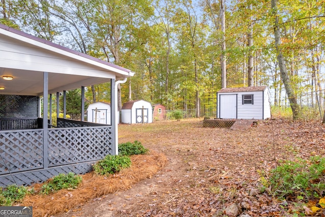 view of yard with a storage unit