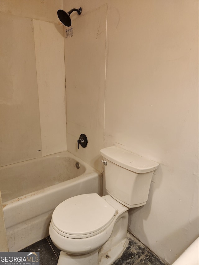 bathroom with toilet and shower / tub combination