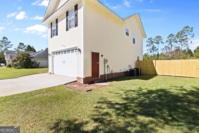 view of property exterior featuring central air condition unit, a garage, and a lawn